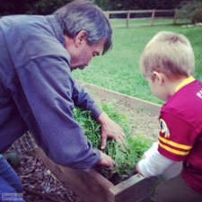 Grandpa and Grayson Carrot Picking