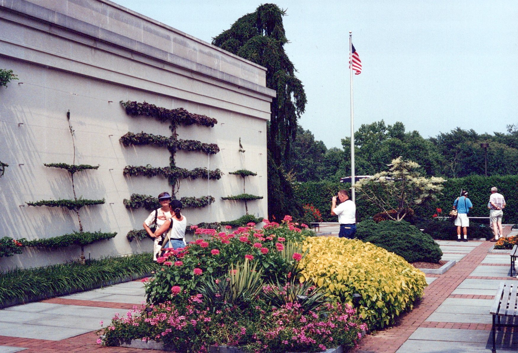 front entrance of Longwood Gardens Variegated Aralia in background 1990