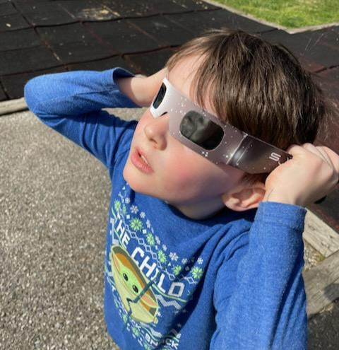 Stephanie's 5 year old grandson watching the solar eclipse