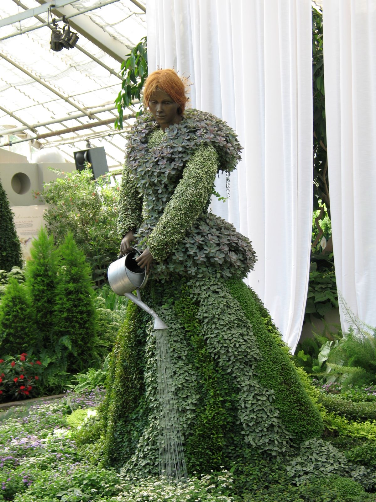 display piece of a mannikin or statue clothed in small tropical plants at the Montreal Botanical Garden